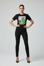 Person wearing a black t-shirt with a colorful graphic design and black pants on a white background