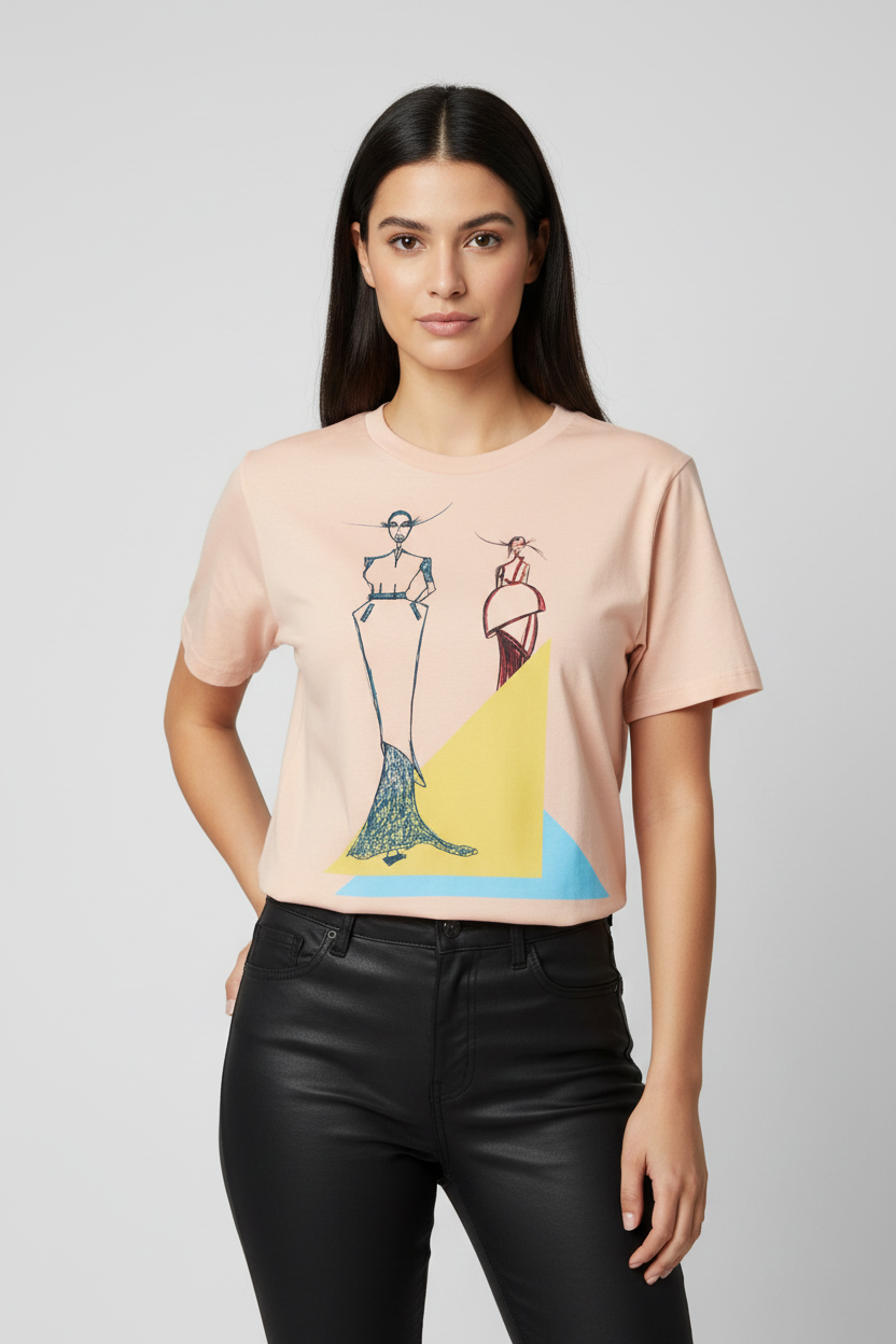 Woman wearing a pink t-shirt with a graphic design on a plain background