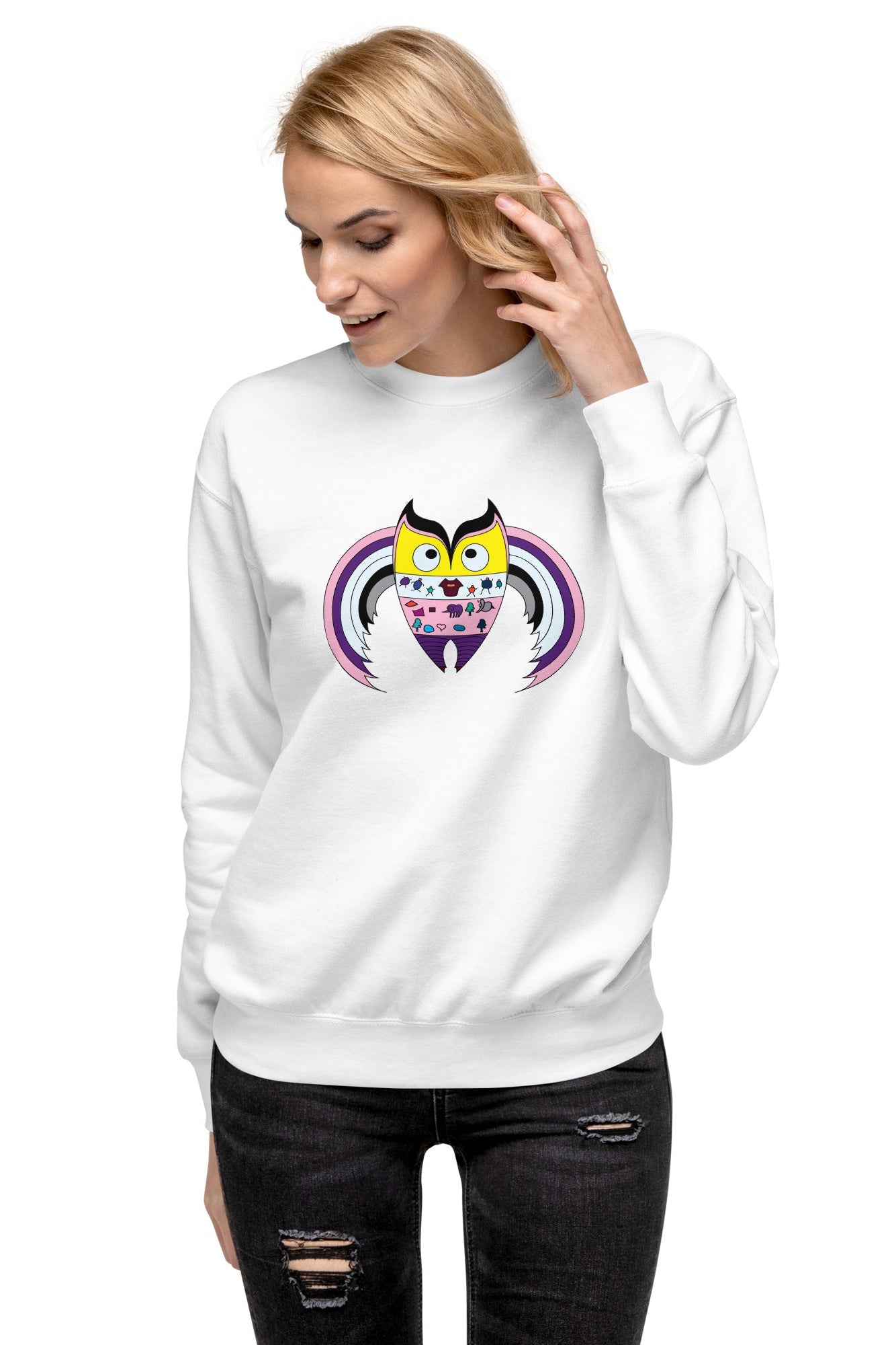 Woman wearing a white sweatshirt with 'COLLEGE NESTERS' text on a white background