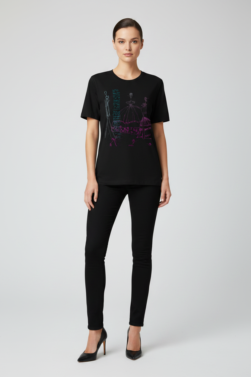 Woman wearing a black t-shirt with colorful graphics and black pants on a white background