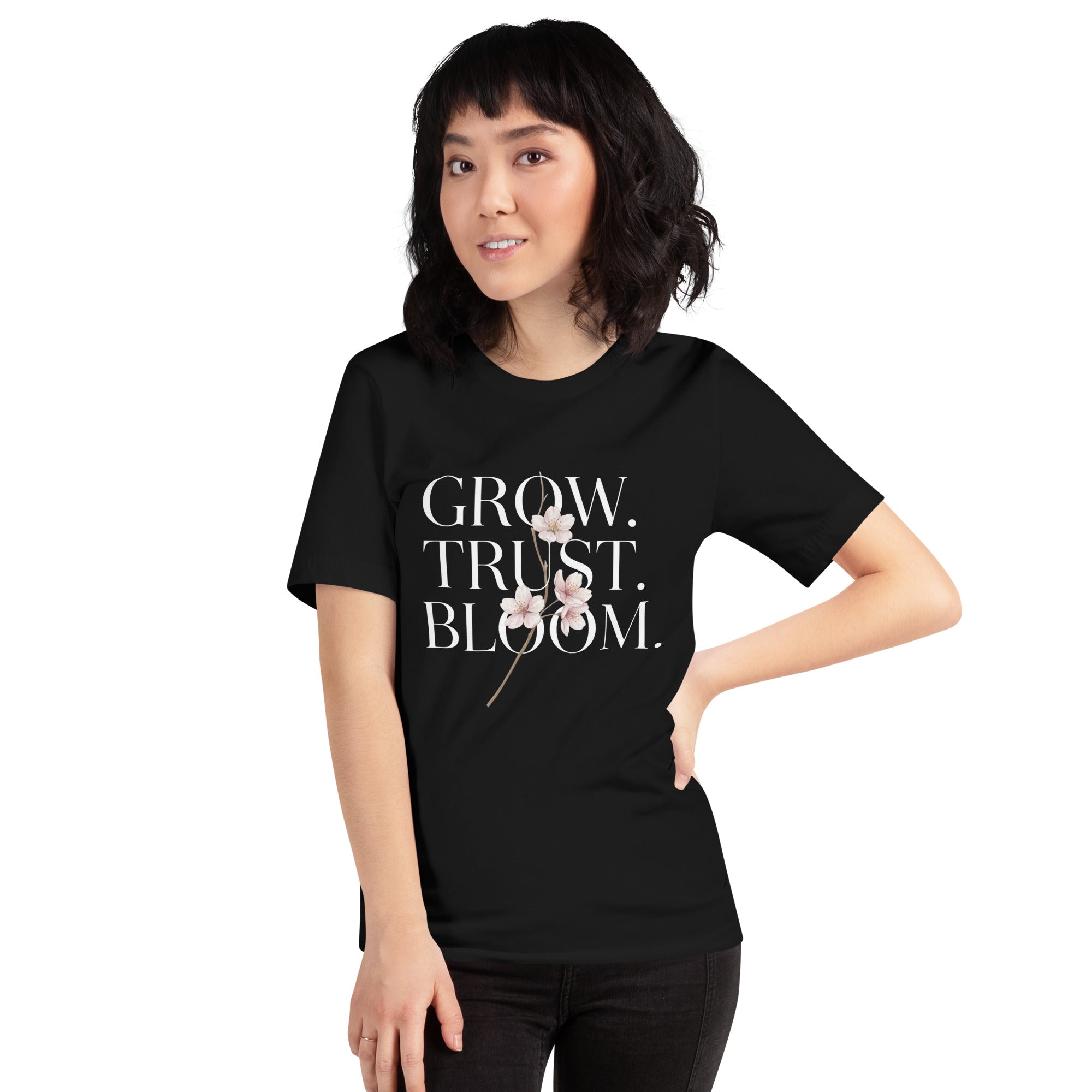 Female model wearing Grow Trust Bloom shirt urban setting