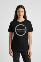 Person wearing a black t-shirt with text on a white background