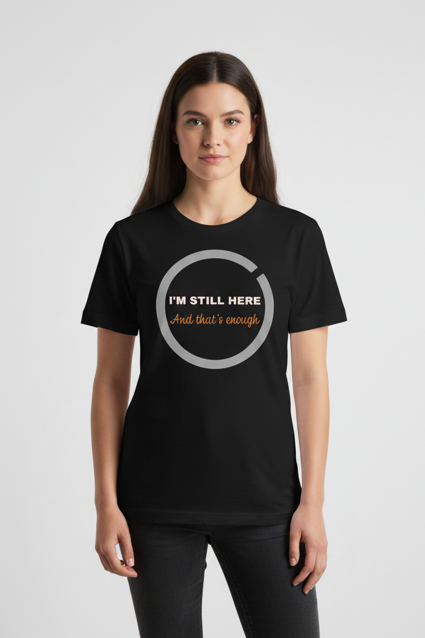 Person wearing a black t-shirt with text on a white background