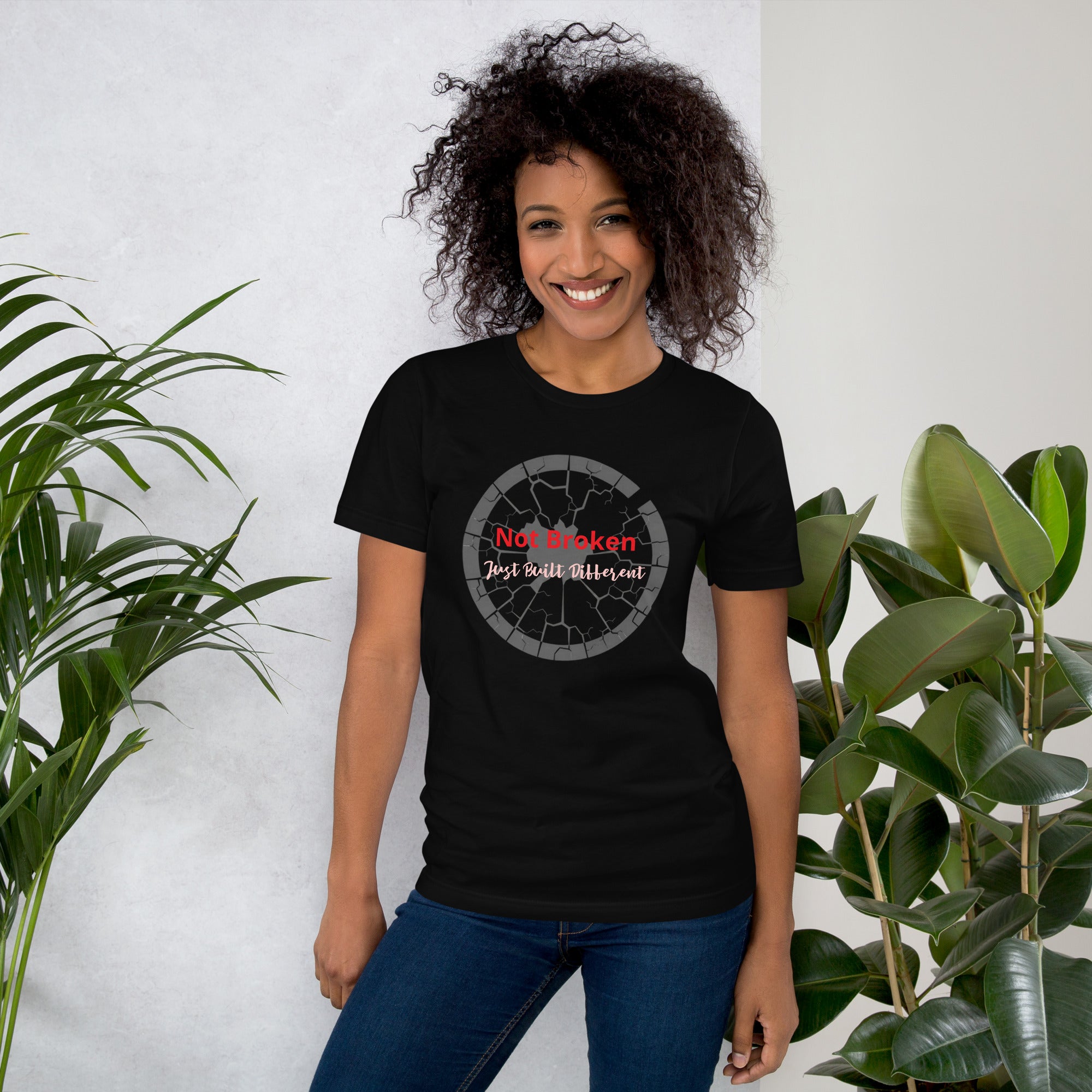 Detailed view of the Apparelhue brand label and neckline on the Not Broken Empowerment T-shirt.