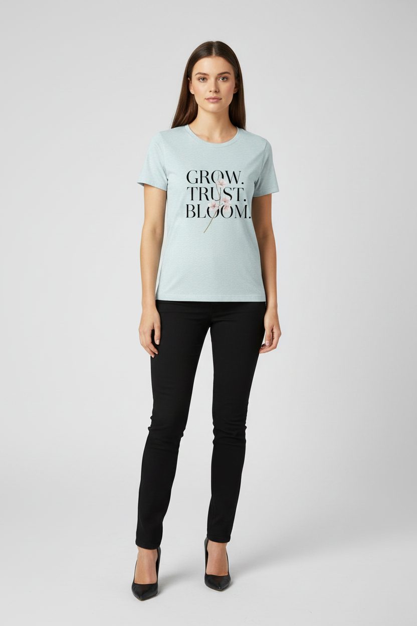 Woman wearing a light blue t-shirt with text on a white background