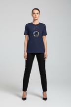 Woman wearing a navy blue t-shirt with colorful graphic design on a white background