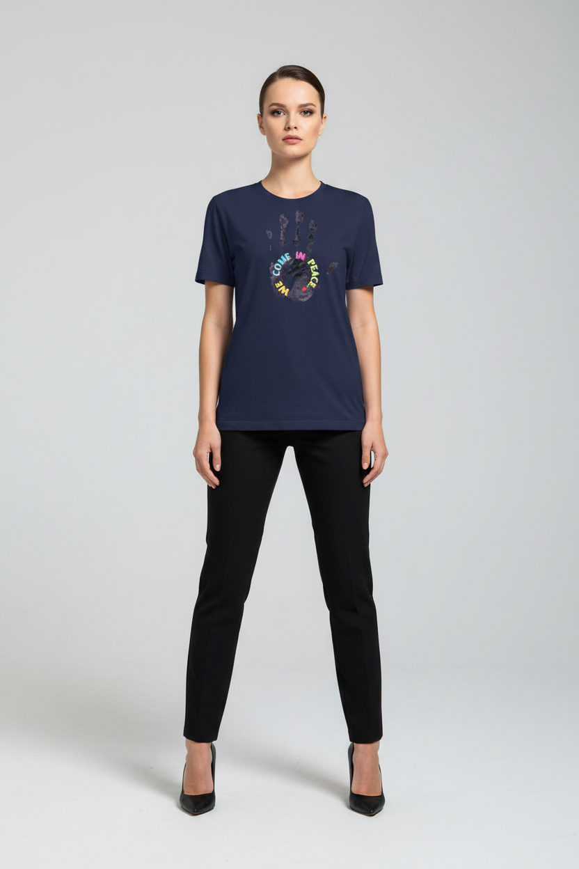 Woman wearing a navy blue t-shirt with colorful graphic design on a white background