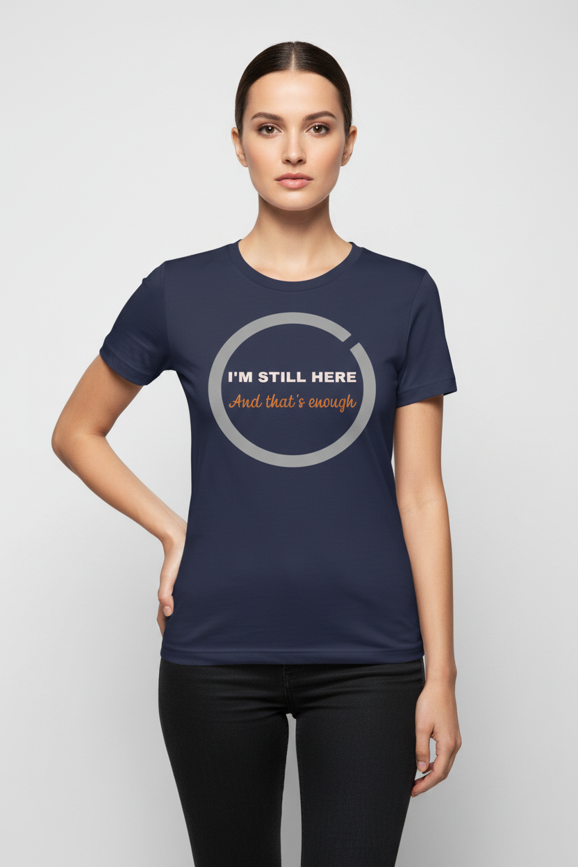 Woman wearing a navy blue t-shirt with text on a light gray background