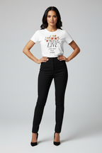 Woman wearing a white t-shirt with text and black pants on a gray background