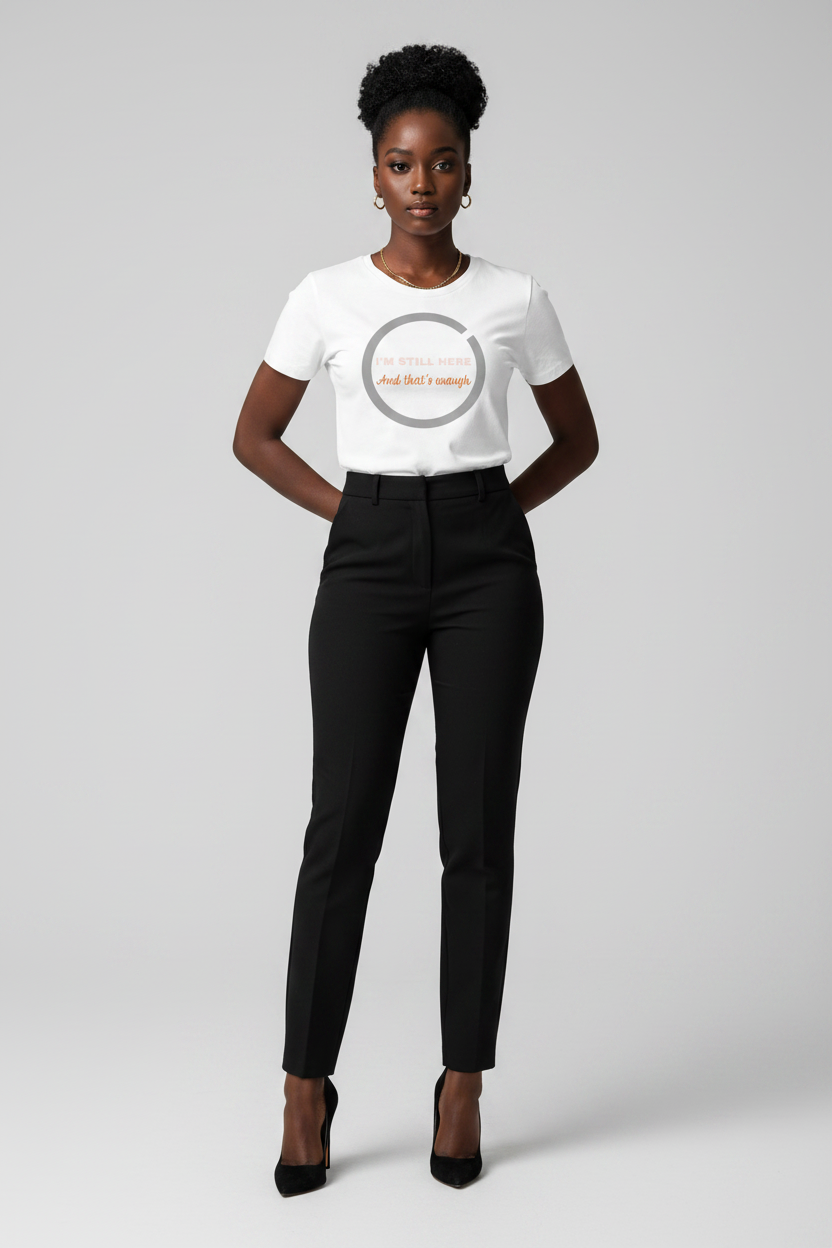 Person wearing a white t-shirt with a logo and black pants on a light gray background