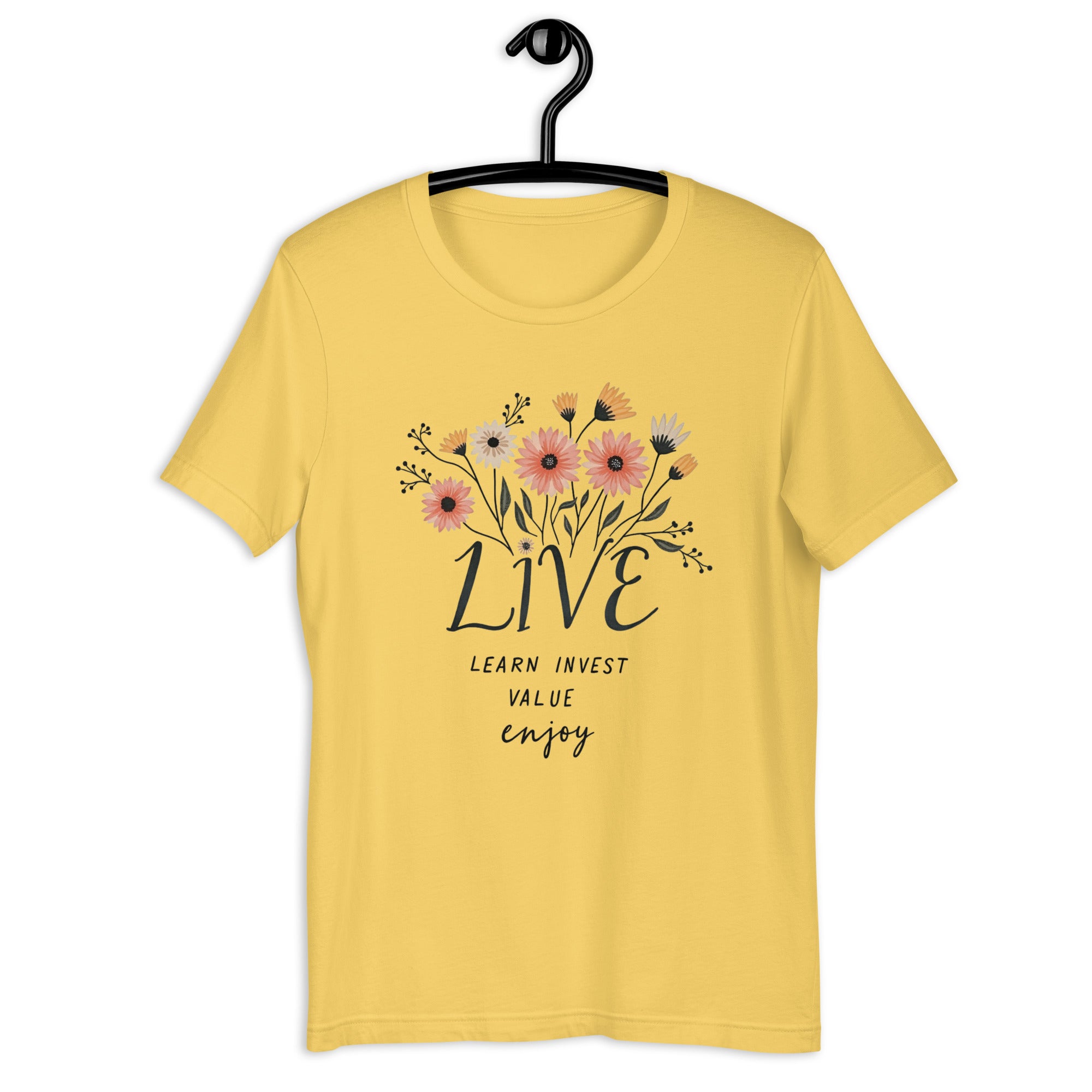 Happy person wearing LIVE Learn Invest Value Enjoy tee outdoors